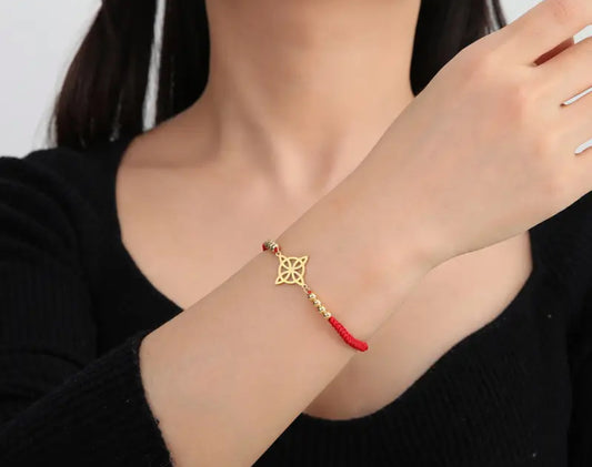 Pulsera roja nudo de brujas