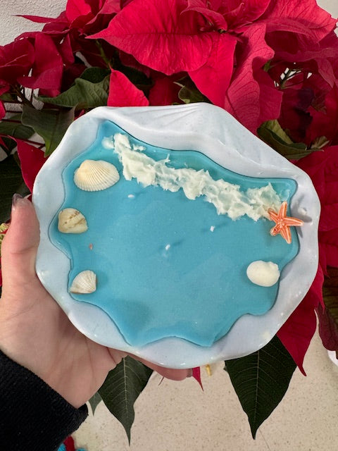 Vela en forma de concha